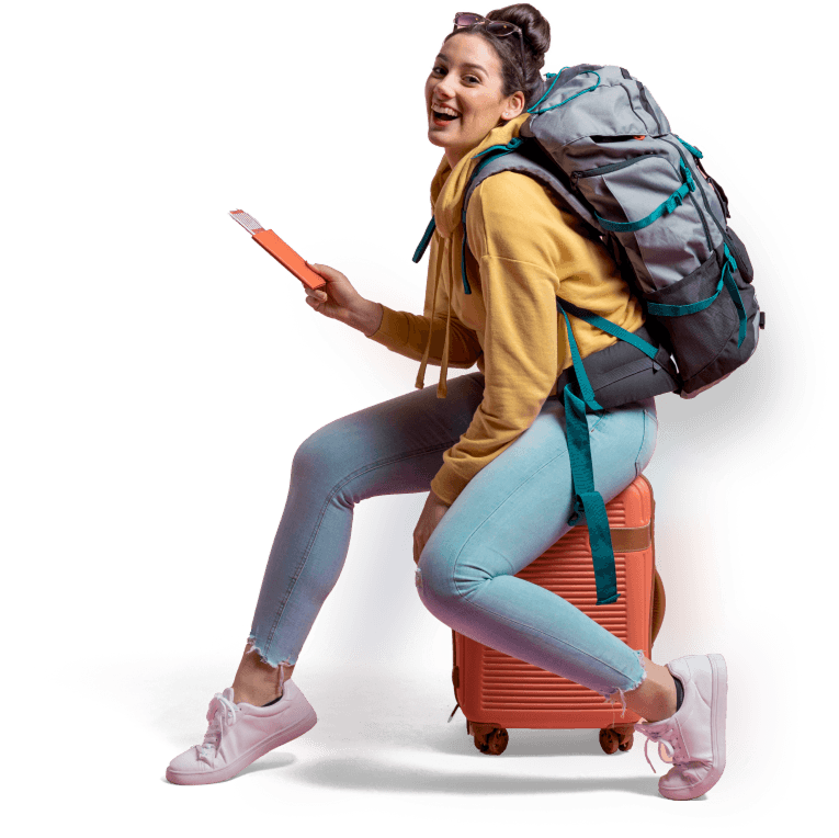 Woman traveler with backpack and suitcase